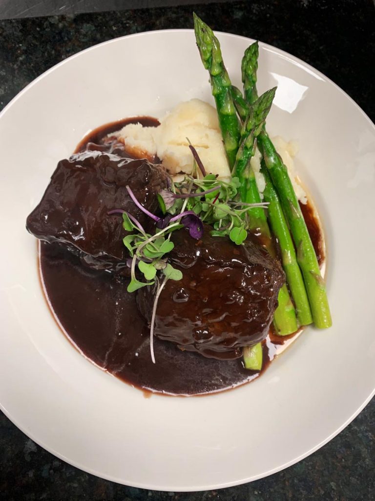 Braised Short Ribs - certified angus beef, mashed potatoes, black pepper demi-glace, asparagus
